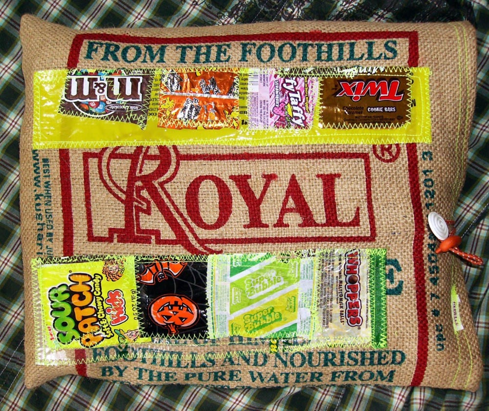 Talk about green! What a cool idea! I have many jute bags lying around home. Time to turn them into something cool. From Rebelle Boutiques Etsy Shop