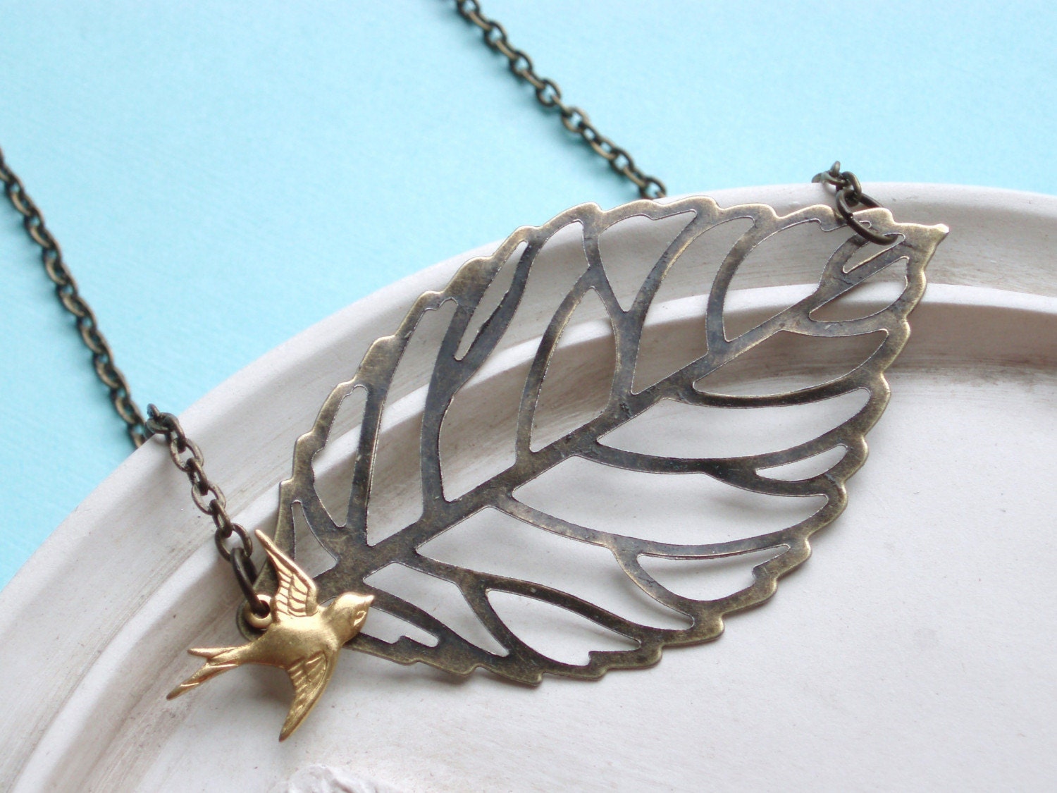 Flying Free - Brass Bird and Leaf Necklace