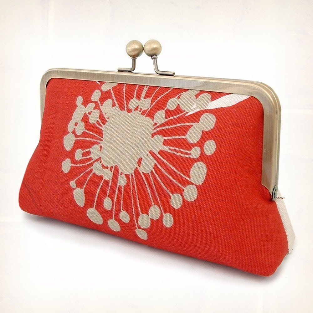 Poppy central silk-lined clutch bag