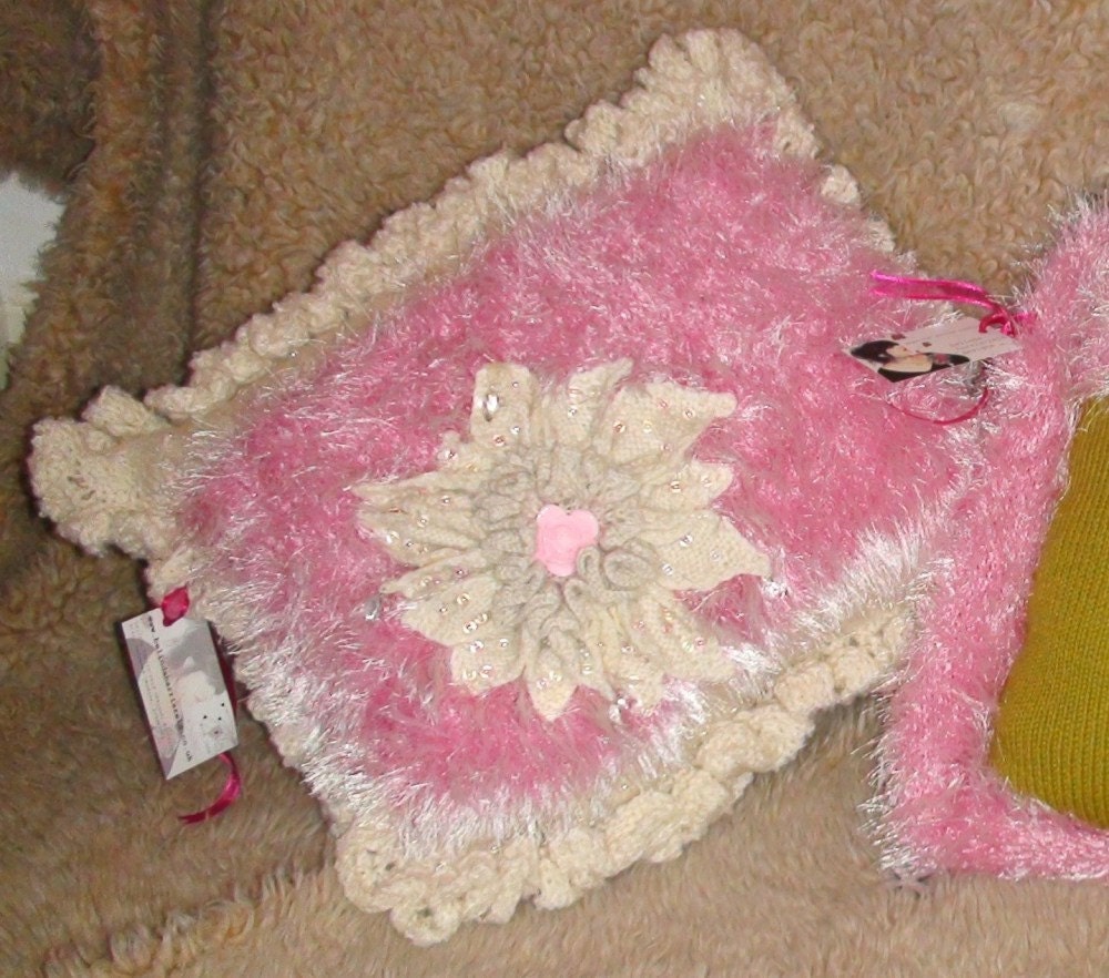 Pink and cream lusicous knitted cushion with HUGE flower and embellishments and frill