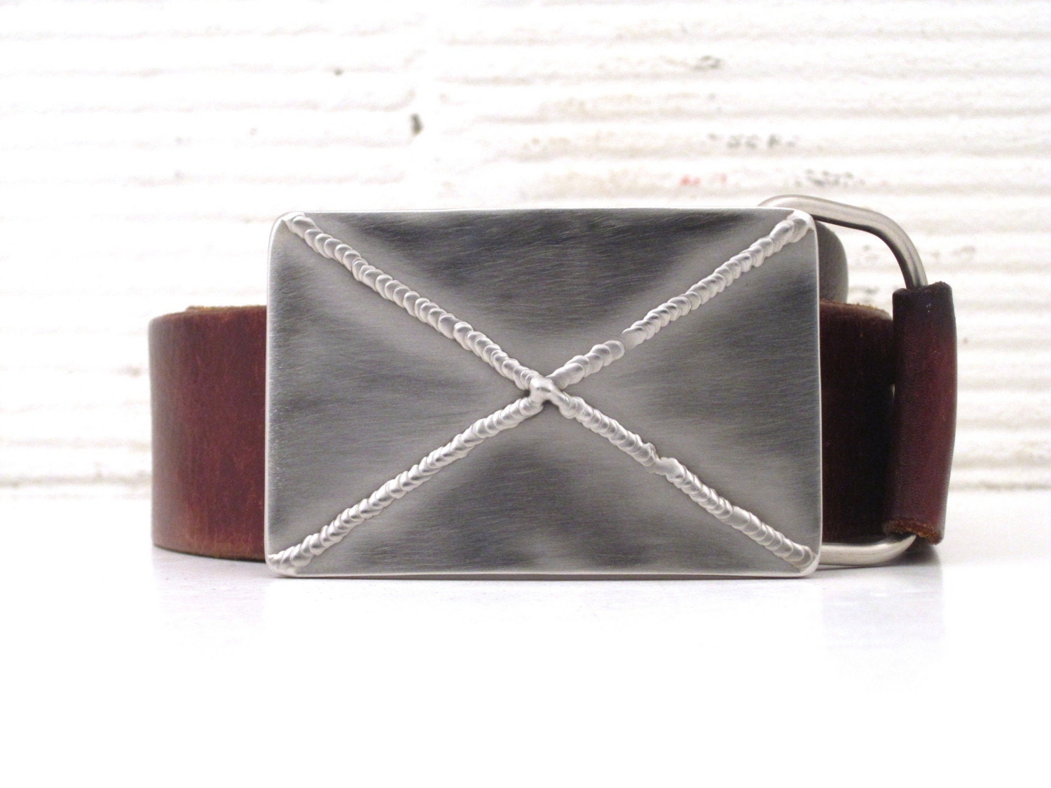 X marks the spot tig welded stainless belt buckle