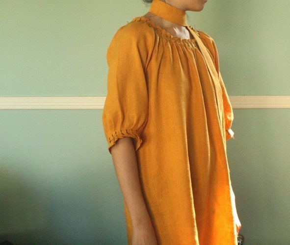 saffron dress with hand pleated neckline