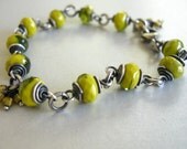 chartreuse and green glass bracelet. contemporary glass beads, sterling silver
