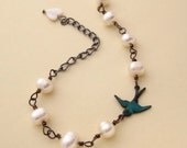 One Swallow Bracelet, freshwater pearls, antiqued teal bird, mother of pearl, wire wrapped
