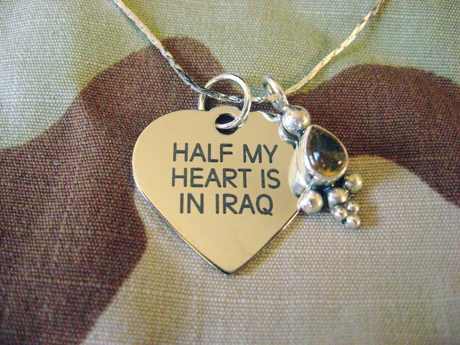 Half My Heart Is In Iraq Customizable Heart Charm Necklace with Citrine Pendant by Outside Cat Art.