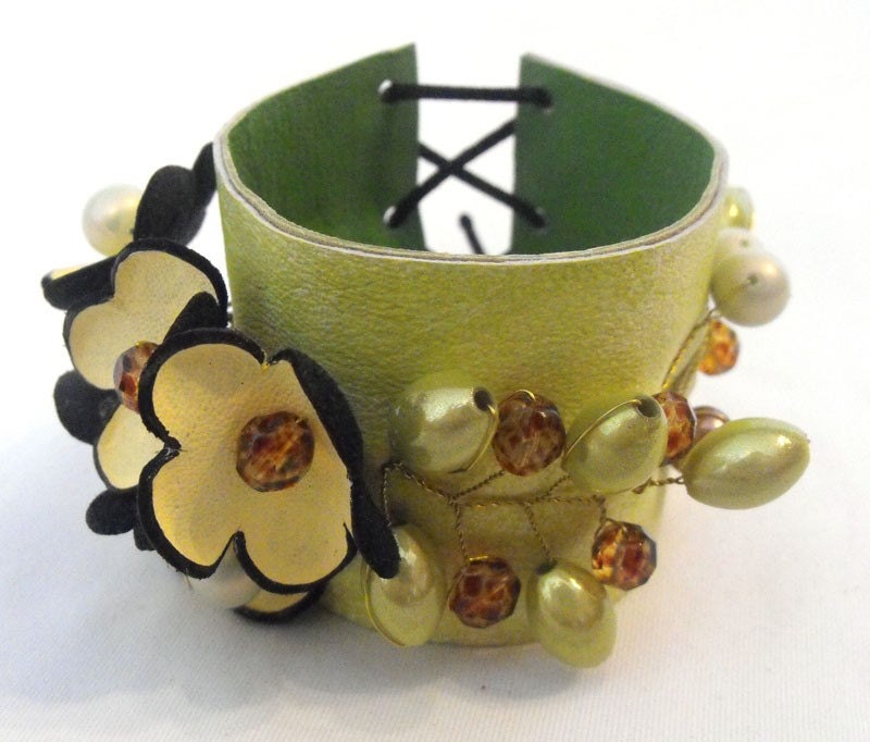 Leather bracelet. Leather floral cuff bracelet. Yellow and green color corsage.