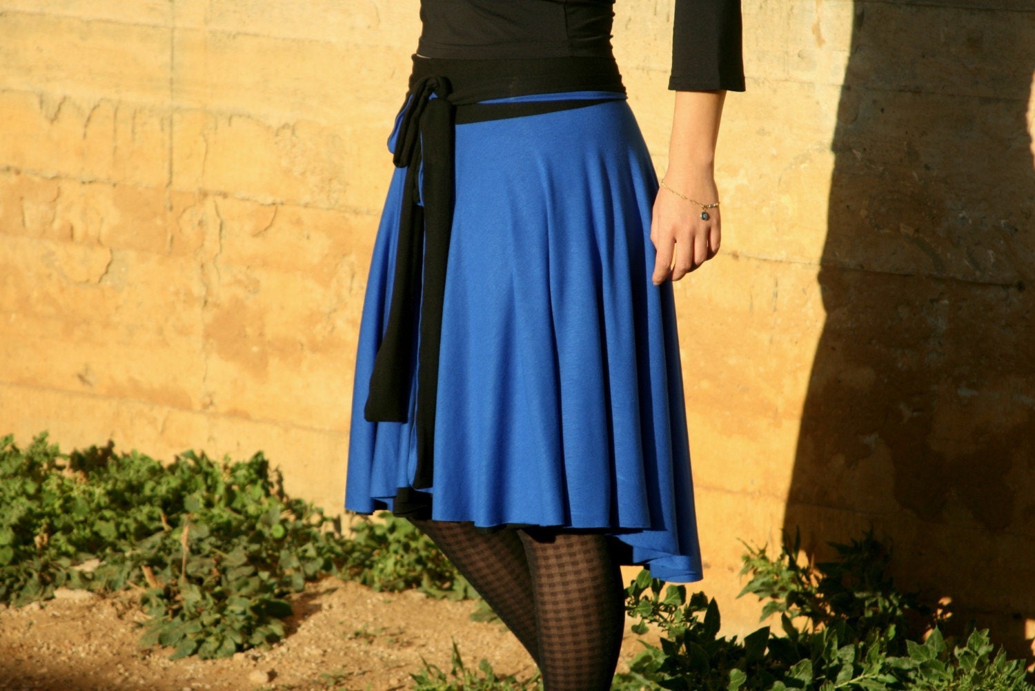 black knee length skirt. Asymmetric Knee Length