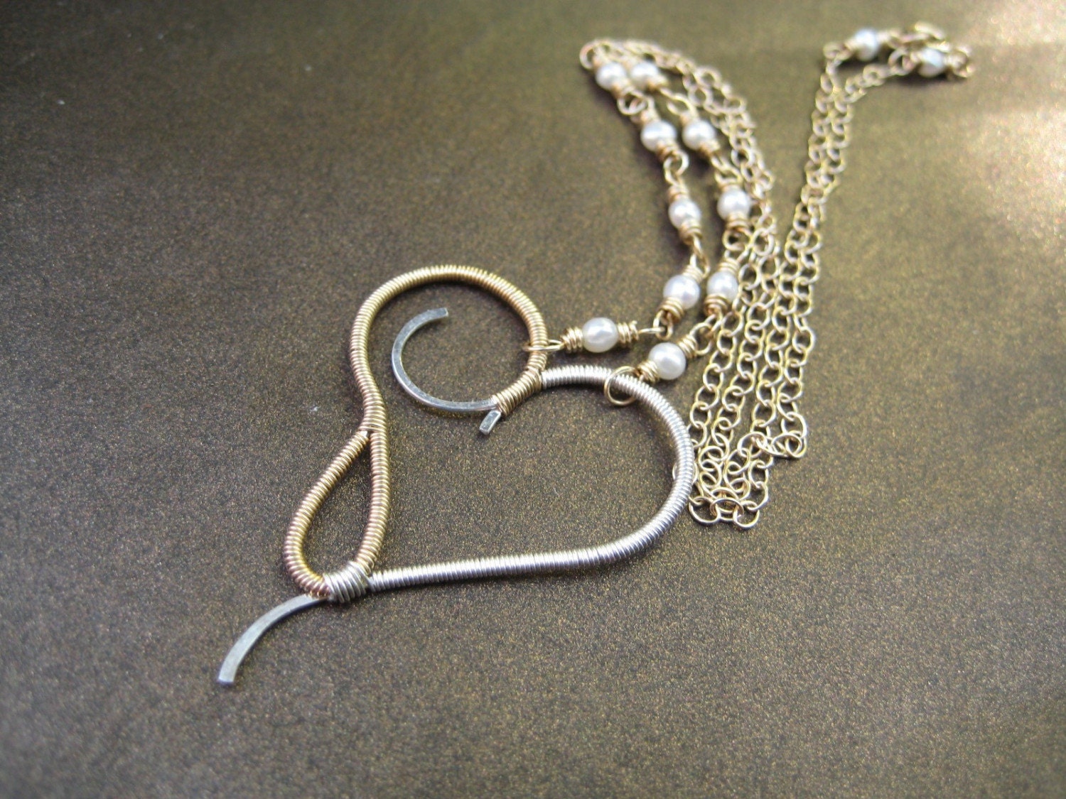 Terpsichore - mixed metal heart necklace