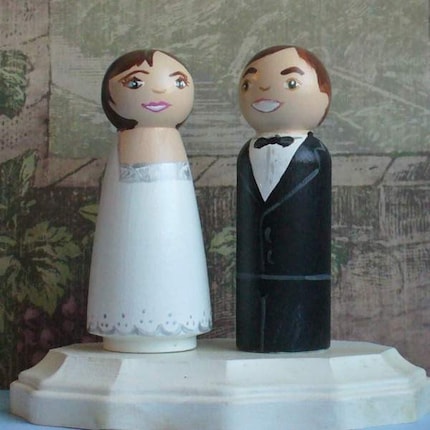 I love these personalized wedding cake toppers that are on Etsy