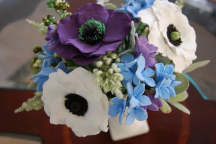 Wedding centerpieces arrangement with hydrangeas and anemones