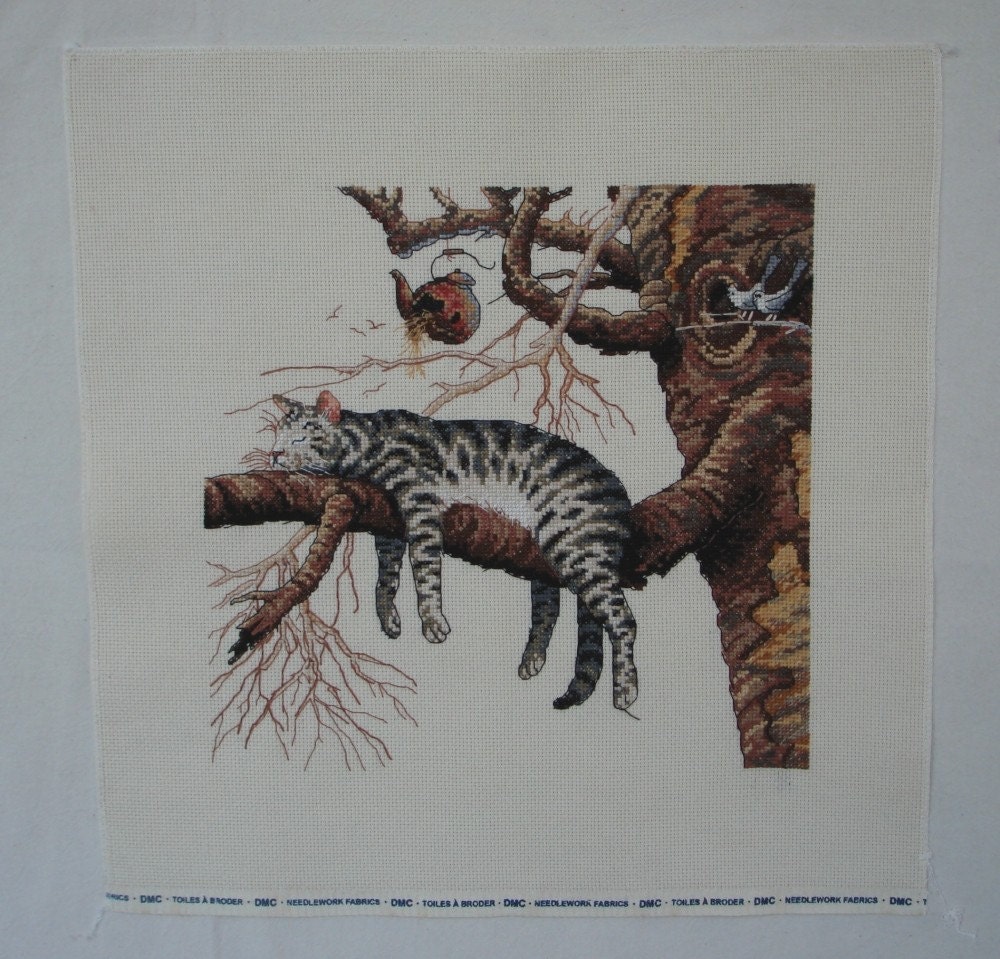 completed cross stitch cat