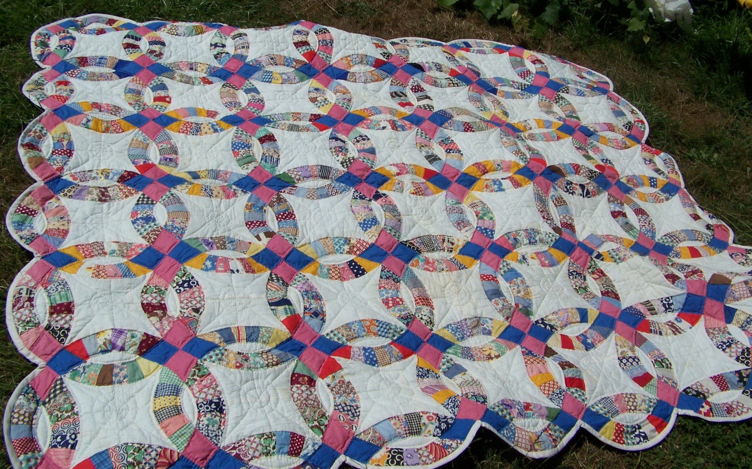 Double wedding ring quilt with a HIstory kinda vintage