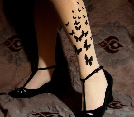 black butterfly tattoos. Butterfly tattoo knee-high