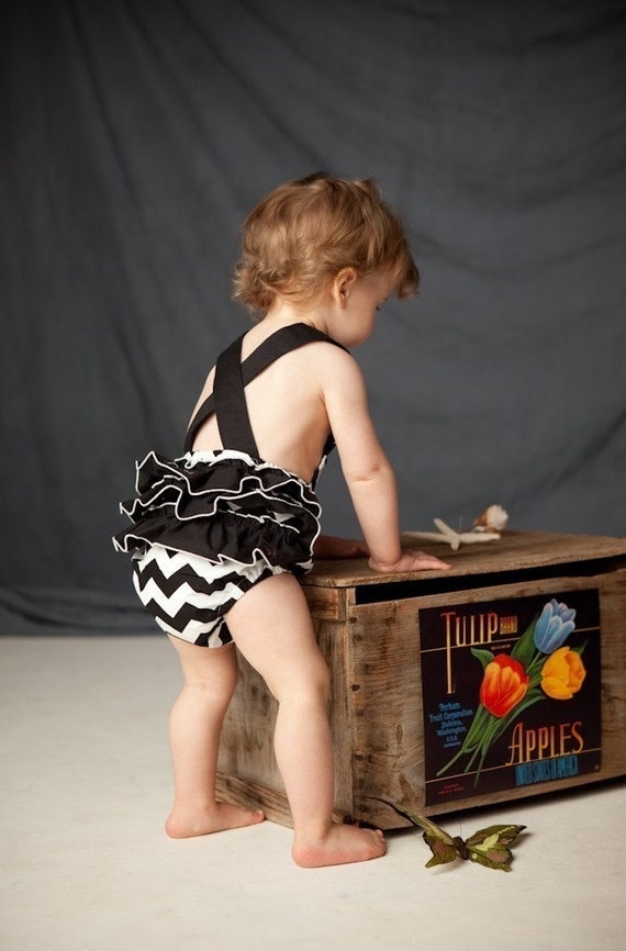 Black and white chevron stripe vintage-inspired sun suit romper, with black ruffles, for your tiny rockabilly hipster