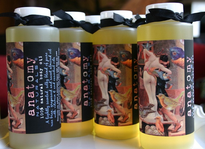 Natural skin softening nourishing body oil for after shower dry hands or a massage with pretty collage art label
