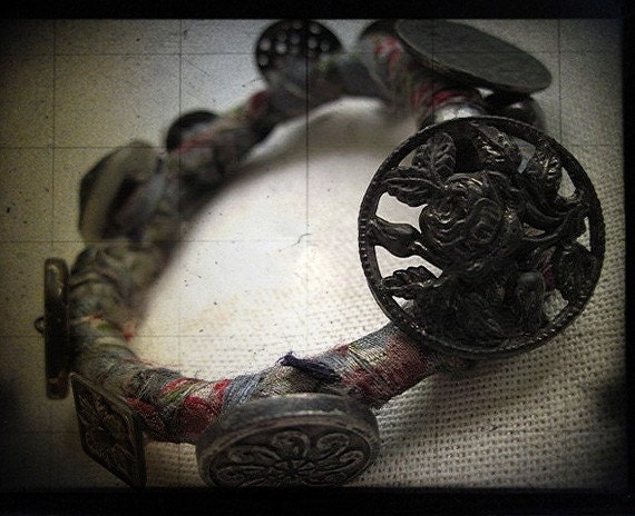 SALE Raqs Sharqui. Hinged Bangle with Antique Cut Steel Buttons.