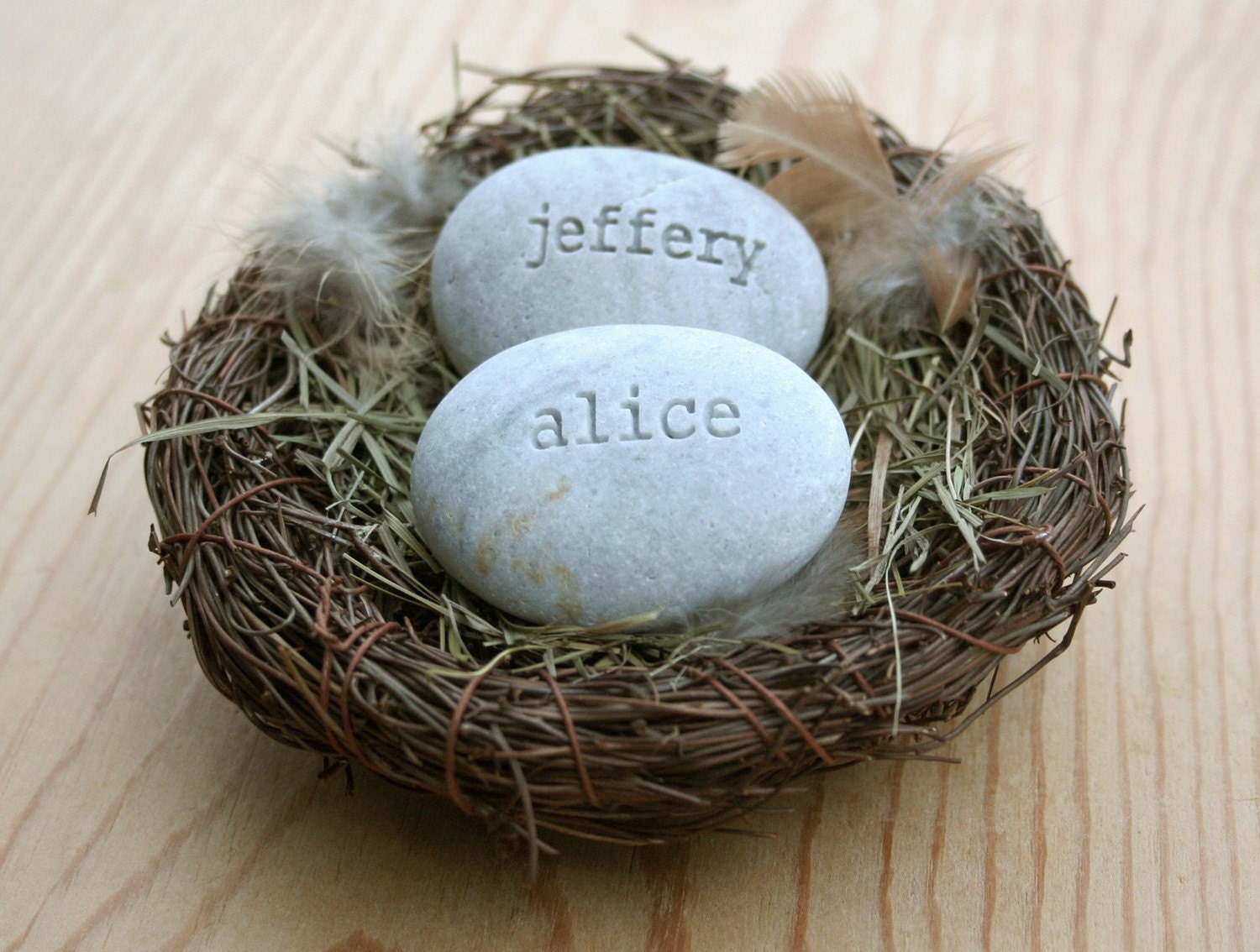 Our nest - custom engraved name stones in nest