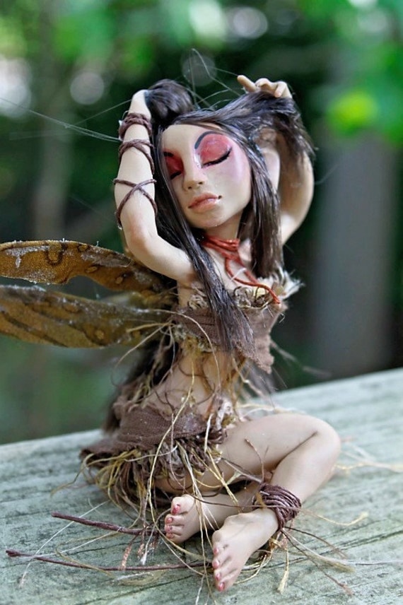 Tawny Myxie Sculpture
