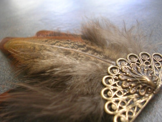 http://www.etsy.com/listing/66797068/hair-pin-fascinator-tribal-pheasant