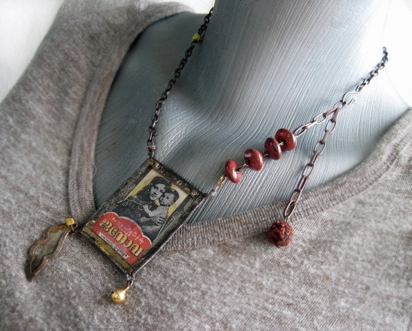 Maji. Double Sided Antique Label Pendant.