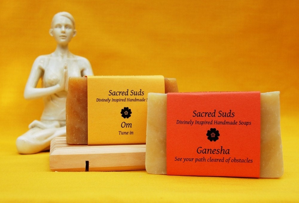 Yoga gift set of Om (Aum) and Ganesha, handmade citrus essential oil soaps (vegan, all natural).  Includes wooden self-draining soap dish and gift wrap.