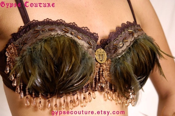 WINGED DELIGHT - Feather adorned bra with beads and a Medieval coin emblem