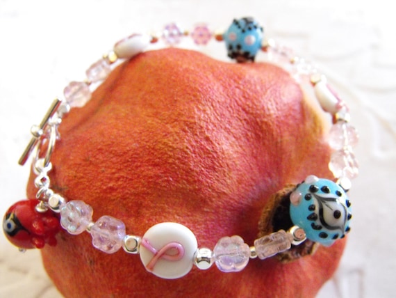 Pink Ribbon Bracelet with Blue Eye Beads