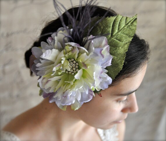 Lavender and plum feathered ruffled fascinator.