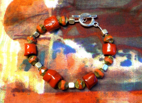 ruby red, glass  and keramic bracelet.