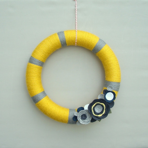 Fall Yarn wreath.  Grey and yellow wreath with Felt Flowers.  Yellow, charcoal, white and dark blue.  12 "door wreath.