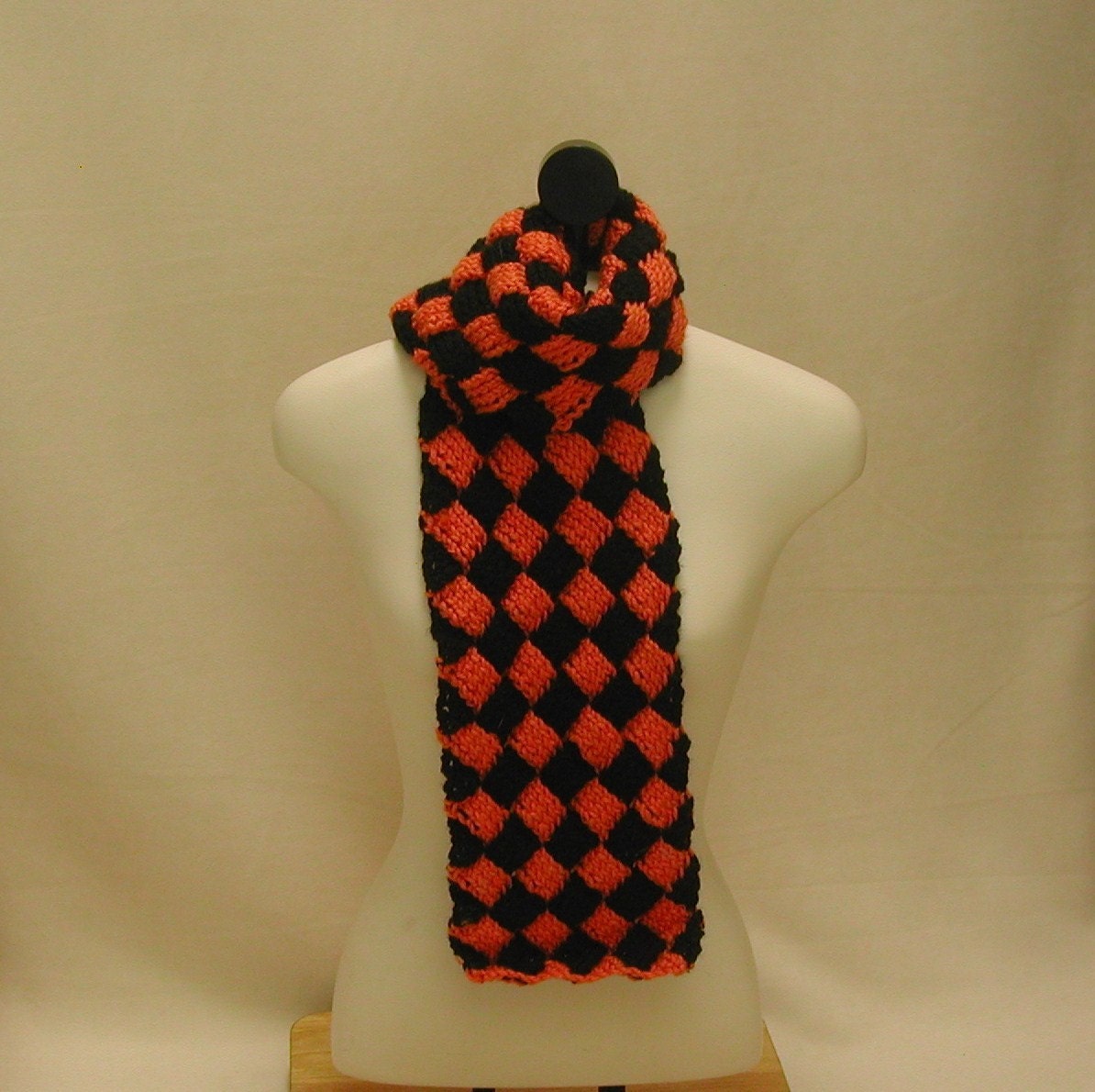 Orange and black entrelac scarf