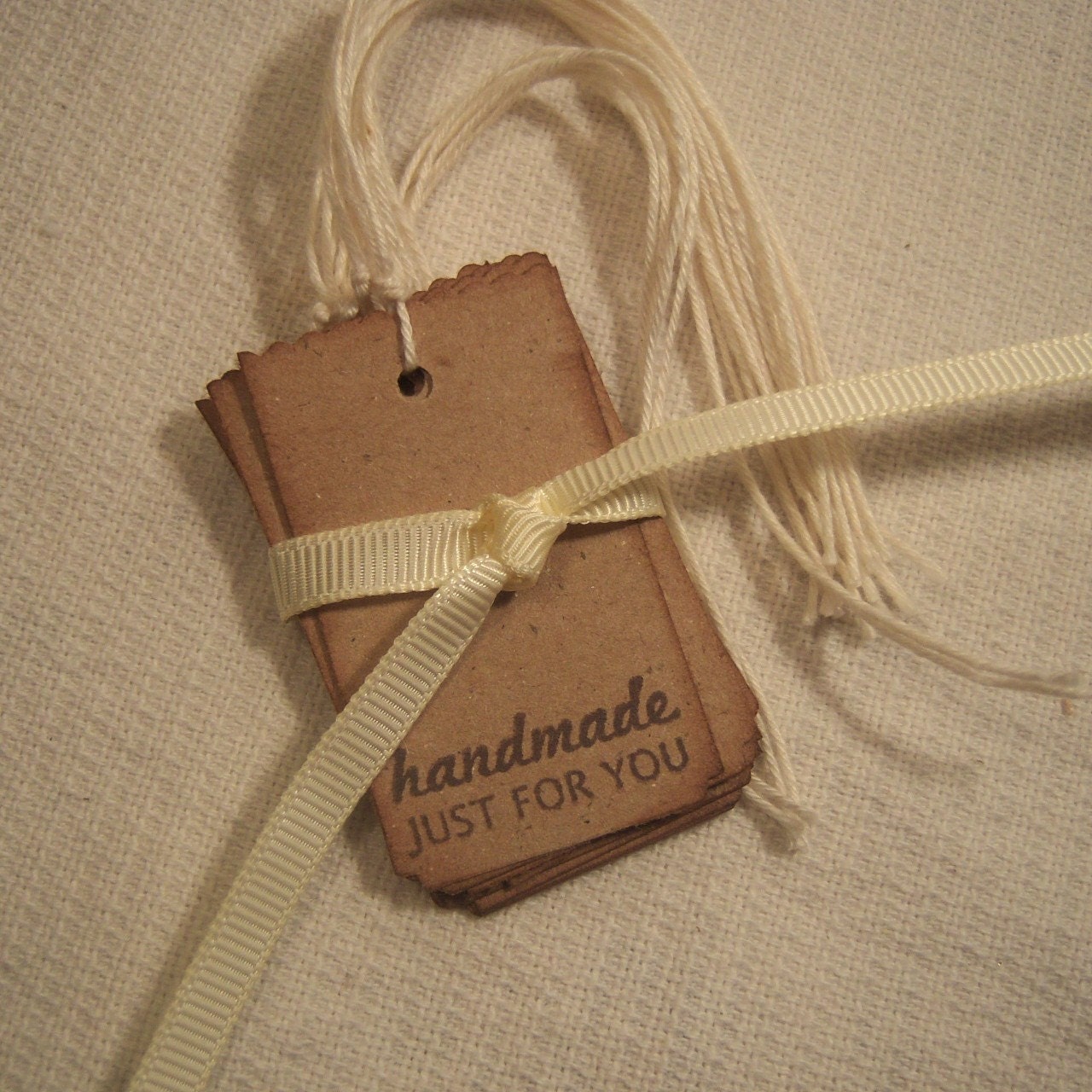 Handmade by hang tags Stamped on Kraft cardstock