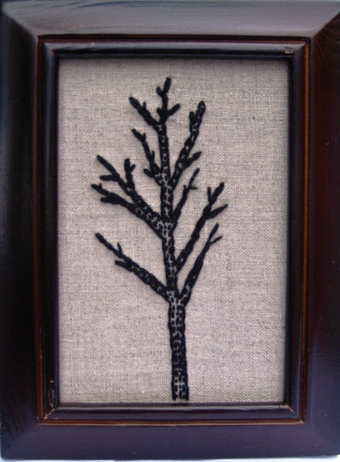 black embroidered tree