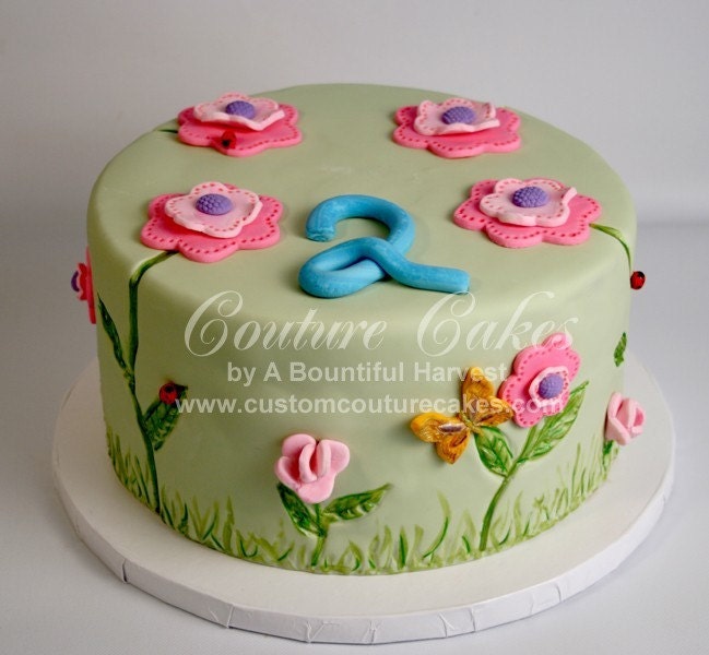 cakes with flowers and butterflies. Flowers and Butterflies