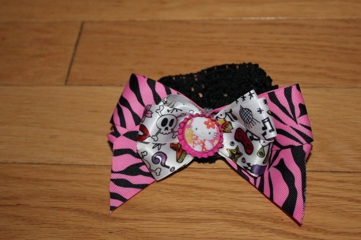 Hello Kitty Rockstar. Hello Kitty rockstar headband, pink, zebra print, rockstar ribbon and a