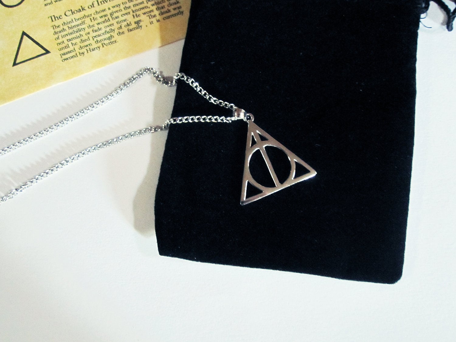 blue Amazonharry potter cursed and Deathlyhallowssymbolnecklaceuk