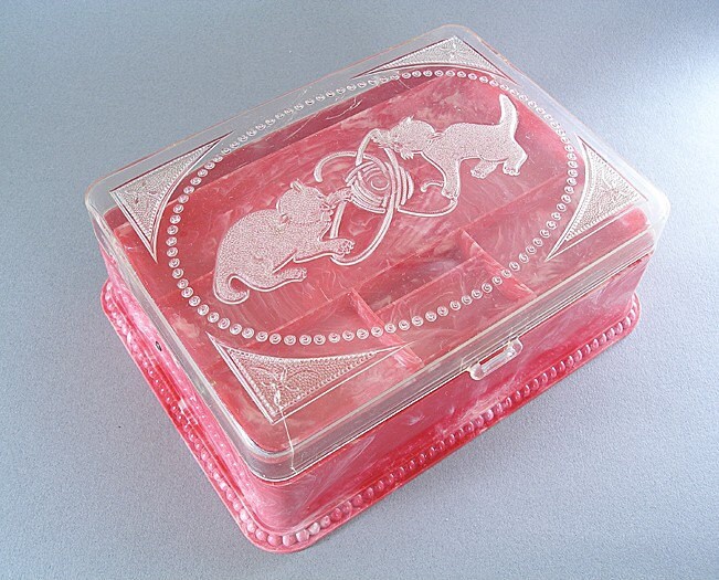 Red swirly plastic sewing box No.1