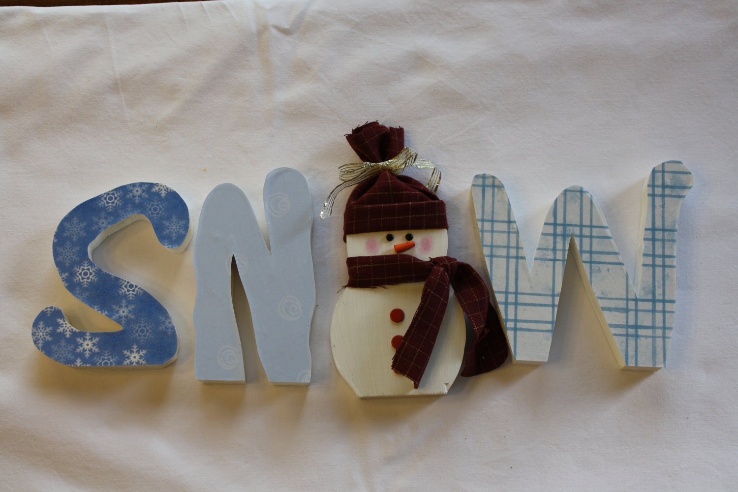 Snow unfinished wood word to decorate your home for the season