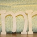 UNFINISHED Summer wood letters has a sun as the "U" and a flip flop as the "E".