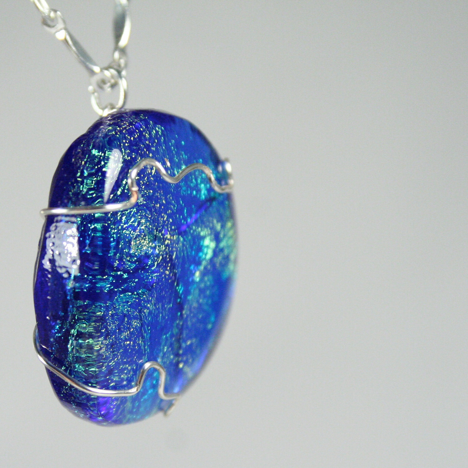 Necklace: Blue dichronic glass wrapped with sterling-filled silver wire
