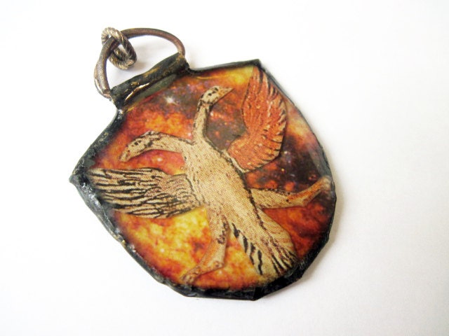 Given Wings. Cosmic alchemy image in resin.