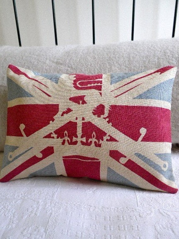 union jack flag with British military lion, crown and sword overlay cushion